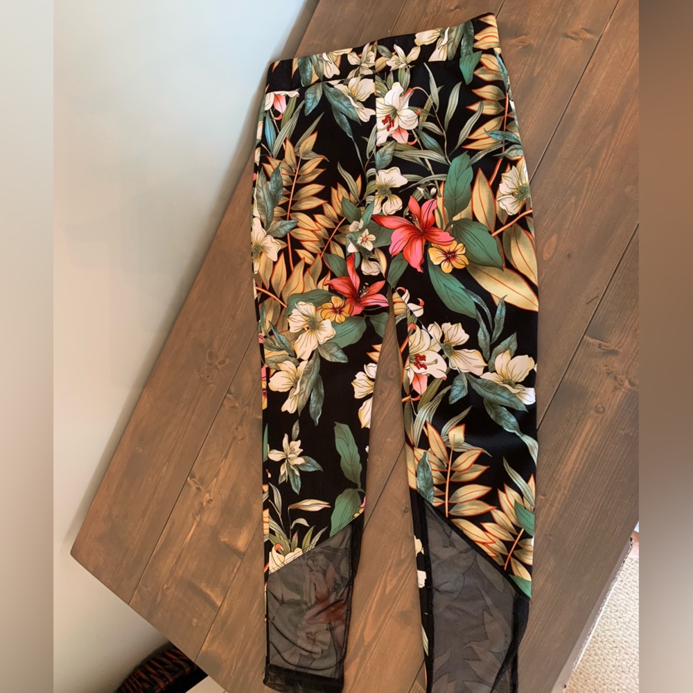 Floral pants with mesh inserts in the back of the legs Polyester and Spandex